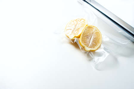 lemon in a vacuum package. Sous-vide, new technology cuisine. Sous-vide. Selective focusの写真素材