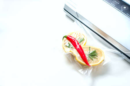 lemon in a vacuum package. Sous-vide, new technology cuisine. Sous-vide. Selective focusの写真素材