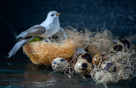 Easter composition, Quail eggs on the old wooden background. Soft focus