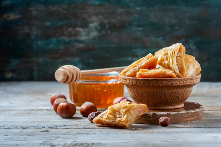 Traditional arabic dessert Baklava with honey and nuts, selective focusの写真素材