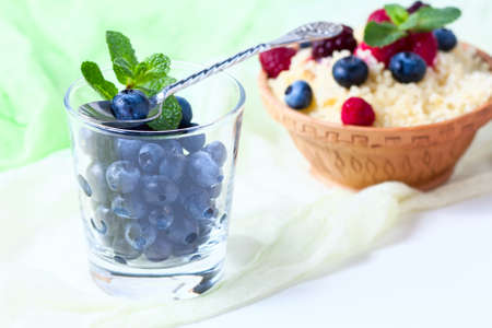 Fresh berries blueberry on a white background. selective focusの写真素材