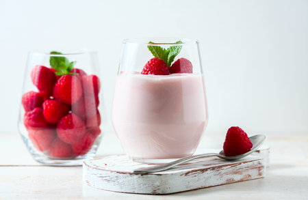 Yogurt smoothie with raspberries, fruit dessert, healthy dieting concept Natural detox.