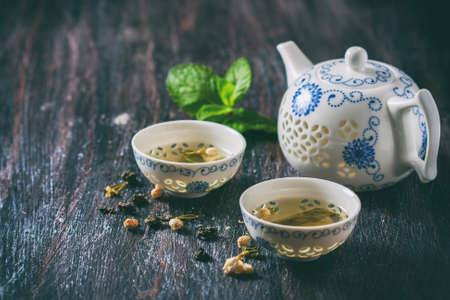 Chinese tea set, green tea and fresh mint. Selective focusの写真素材