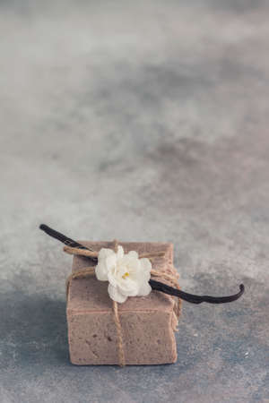 Organic handmade soap with vanilla on a concrete background, spa concept.の写真素材