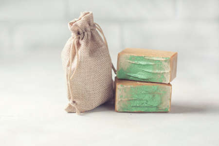 Organic handmade soap and a linen sack. Selective focus. Place for text.の写真素材