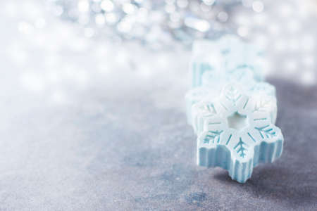 Handmade soap in the form of snowflakes, natural cosmetics concept. Place for text. Selective focusの写真素材