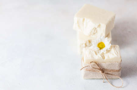 Natural handmade soap with chamomile, the concept of spa and health. Selective focusの写真素材