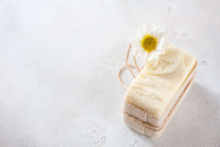 Natural handmade soap with chamomile, the concept of spa and health. Selective focusの写真素材