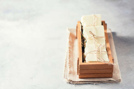 Organic natural handmade soap in wooden box standing. Spa concept. Selective focusの写真素材