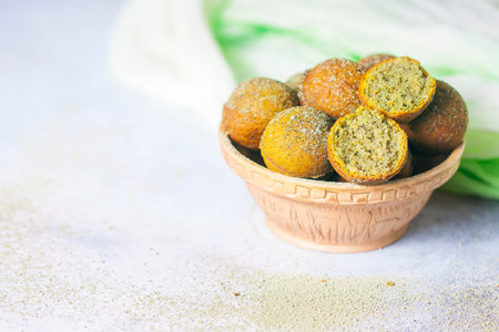 donuts vegetarian with matcha tea. Copy space. Selective focus