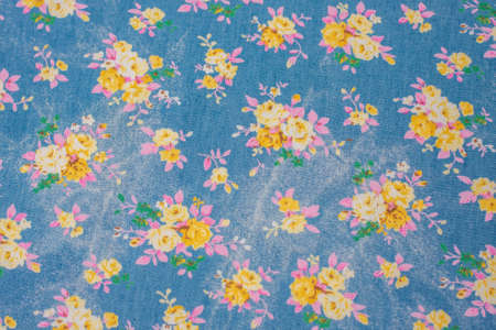 Natural texture of the fabric. A sample of a fabric with a floral pattern. Selective focusの写真素材