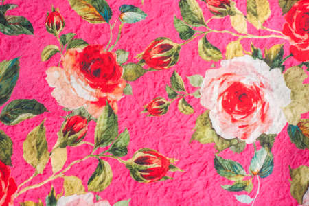 Natural texture of the fabric. A sample of a fabric with a floral pattern. Selective focusの写真素材