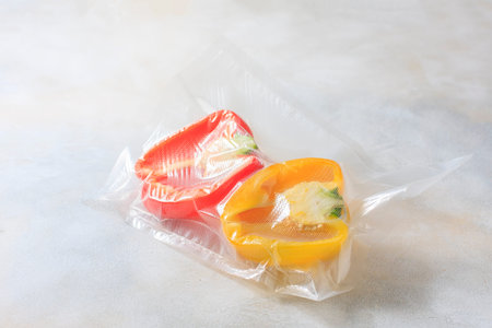 Vegetables in sealed vacuum packing bags. Su-video cooking. Selective focus