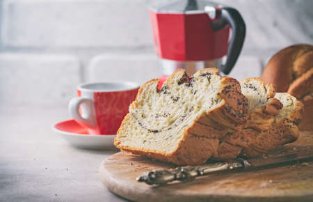 Homemade poppy seed braided bread, selective focus . Wreath. National pastries. Babkaの写真素材