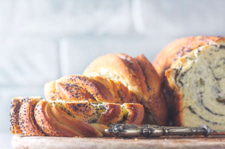 Homemade poppy seed braided bread, selective focus . Wreath. National pastries. Babkaの写真素材