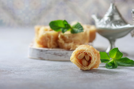 Traditional arabic dessert Baklava with honey and nuts. Selective focus