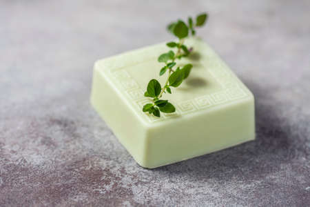 Bars of handmade soap with thyme, the concept of spa and health. Selective focus. Place for text.の写真素材