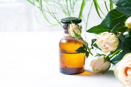 Roses aroma oil, spa and aromatherapy, selective focusの写真素材