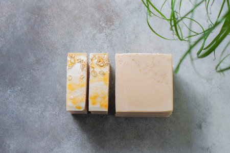 Handmade soap bars with oatmeal flakes. Organic soap making. Spa treatments. Selective focus
