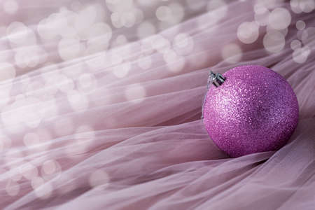 Christmas pink decorations on pastel pink background. Christmas decoration background. Selective focusの写真素材