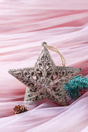 Christmas pink decorations on pastel pink background. Christmas decoration background. Selective focusの写真素材