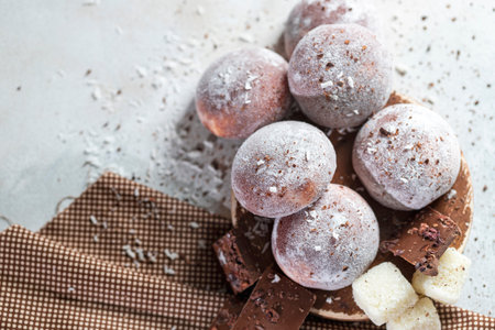 Chocolate coconut Japanese ice cream Mochi in rice dough. Traditional Japanese dessert on white...