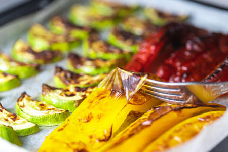 Grilled vegetables - zucchini, pepper. Vegan food. The concept of organic food. Copy space. Selective focus, top view.の写真素材