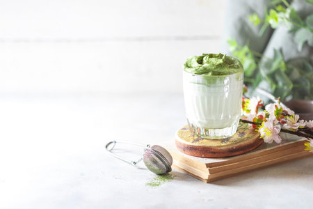 Match Dalgona Latte, Match cream, on a white background. Matcha green tea. Copy space, selective...
