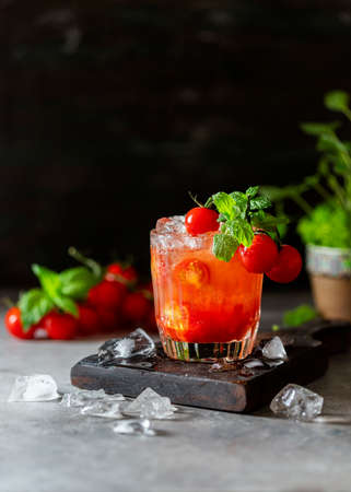 Ice tomato juice in a glass goblet.の写真素材