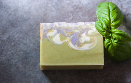 Bars of handmade soap with basil, the concept of spa and health.の写真素材