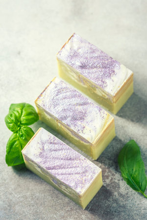 Bars of handmade soap with basil, the concept of spa and health.