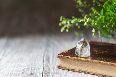 Old book and mineral stones crystals. Crystal Ritual, Healing Crystals. Natural gemstones. Gemstones...