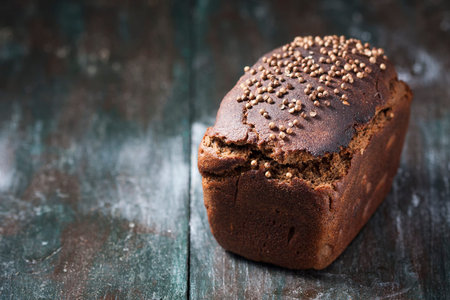 Traditional Russian rye Borodino bread. style rustic. Copy space, selective focus