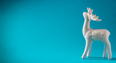 White deer on a blue background. New year concept. Selective focus, copy space