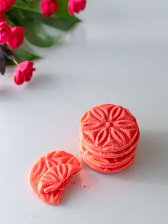 Sable Breton biscuits or french butter cookies. Red cookies on a white background.の写真素材