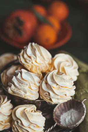 Homemade fruit marshmallow with persimmon. Zefir. Homemade healthy sweets, natural sweets. Selective focus, close-upの写真素材