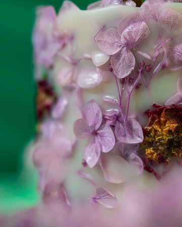 Soy candle handmade with flowers. Beautiful handmade candle. Relaxation atmosphere. Luxurious...