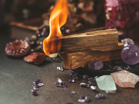 Palo Santo, holy sacred tree stick, burning with aroma smoke. healthy lifestyle. Esoteric life balance, good energy concept. Healing energy with crystals and smoke. copy spaceの写真素材