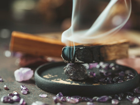 Palo Santo, holy sacred tree stick, burning with aroma smoke. healthy lifestyle. Esoteric life balance, good energy concept. Healing energy with crystals and smoke. copy spaceの素材 [FY310185439093]