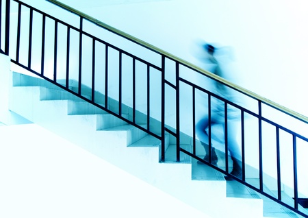 Woman on the stairs(Blue)の写真素材