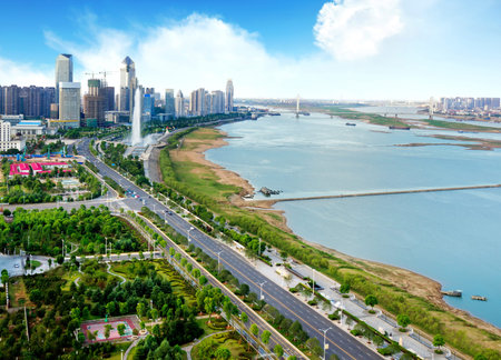 Urban Landscape,Blue sky and white clouds, a river city.