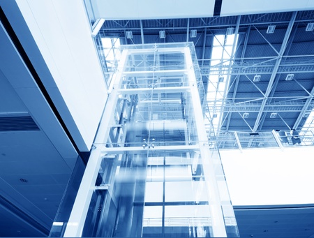 futuristic elevator in the modern building at shanghai china.の写真素材