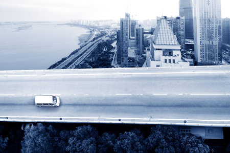 The city's overpass system, through the height of the bridge.
