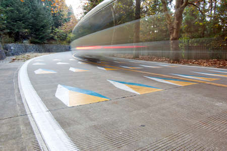 Mountain roads, high-speed car, autumn scenery.の写真素材