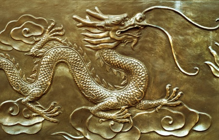 Carved on the ancient Chinese architecture: dragon, symbol of power and good fortune.の写真素材