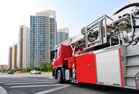 Red fire engine, is waiting for departure.の写真素材