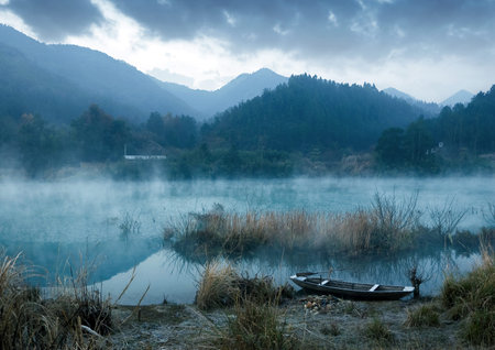 Winter morning, a mist on the lake の写真素材