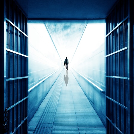 The men in the underground pedestrian tunnelの写真素材