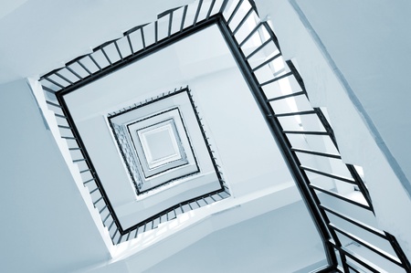 Rectangular rotating ladder, step by step, there is sense of perspective.の写真素材