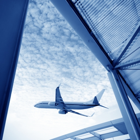 Blue sky, the Shanghai Pudong Airport aircrafの写真素材